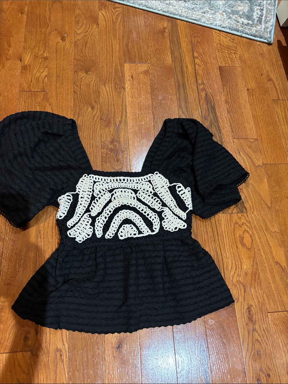 Black Peplum Top with Ivory Crochet Bodice